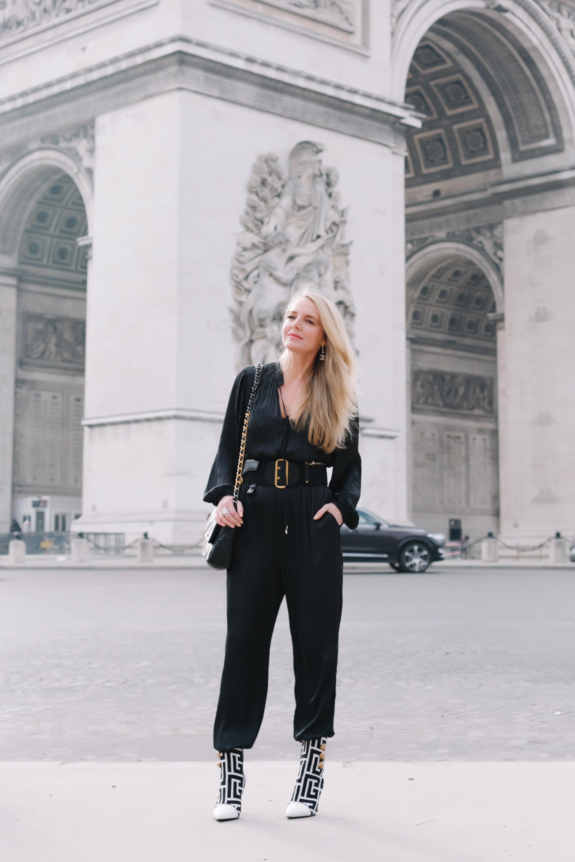 Erin Busbee at the arc de Triomphe in Paris photo by Rachel Calvo Portraits
